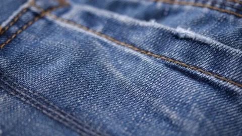 Close-up of blue denim jeans texture in dolly shot Stock-Footage 144514925