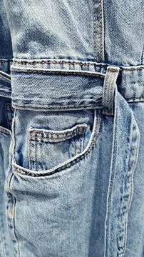 Close-up of blue denim jeans texture background Stock Photos