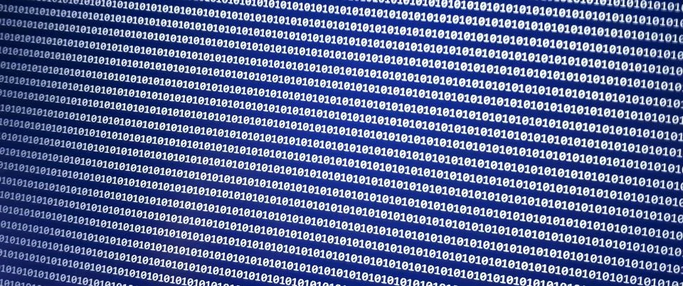 Close-up of a blue digital background featuring a pattern of binary code, Stock Photos