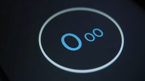 Close-up blue digital timer in white circle on black backdrop. 15 second Stock Footage 128438474