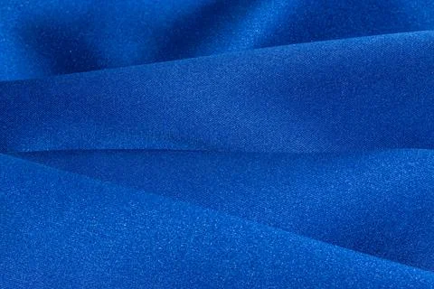 Close up of blue draped textile material. Stock Photos