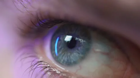 Close-up of blue eye blinking in Slow Motion. Young man open eye. Stock Footage 168950254