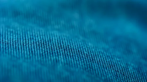 Close up of blue fabric texture showing fine threads and detailed textile Stock Footage 316755260