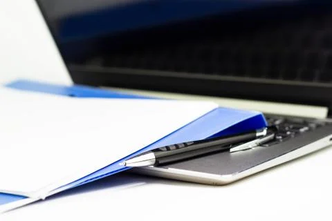 Close Up Blue file folder and Laptop Computer on desk in meeting room, busine Foto stock