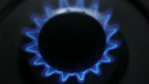 Close-Up of Blue Gas Flame Igniting from Above for Cooking and Energy Concepts Stock Footage 220638644
