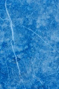 Close-up of blue marble texture with white veins and scratches Stock Photos