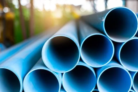 Close up to blue plastic pipe background, PVC pipes stacked in warehouse, Stock Photos