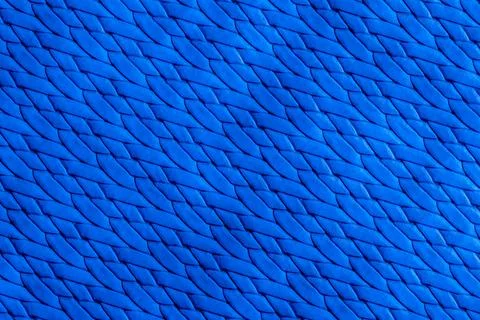 Close-up of blue plastic woven texture, showing detailed horizontal and verti Stock Photos