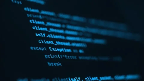 Close up of blue programming code running on dark computer screen Stockbeeldmateriaal 315983433