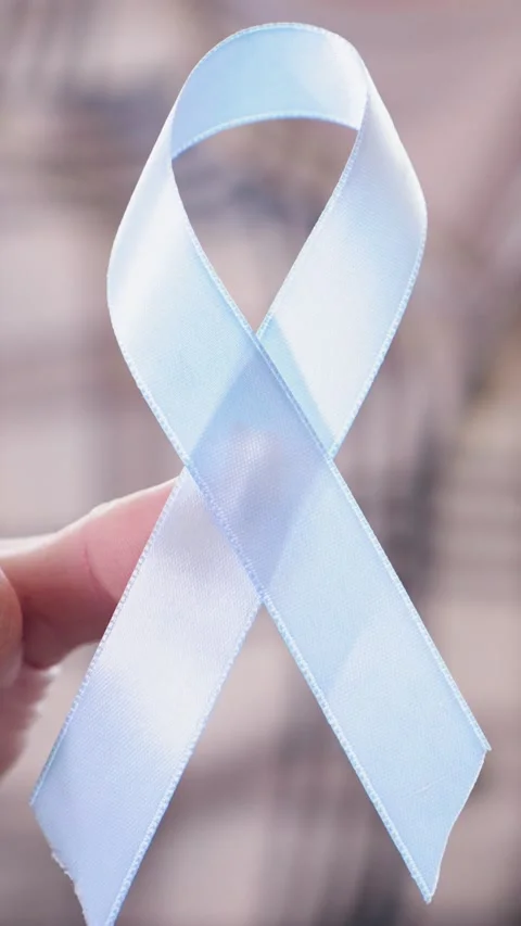 Close-Up of Blue Ribbon for Prostate Cancer Awareness Vídeos de archivo 320039986