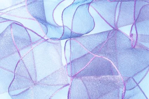 Close up of blue  Ribbons On Background, wavy pattern like flower Stock Photos