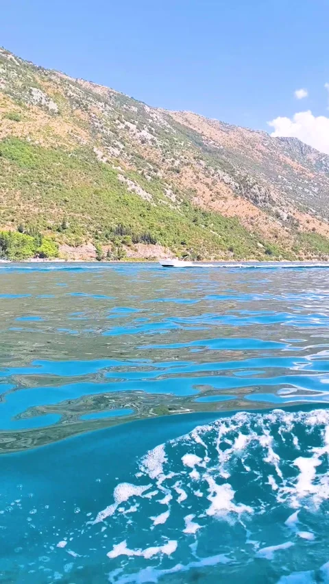 Close up of blue sea surface rippling in sunlight Stock Footage 340533365
