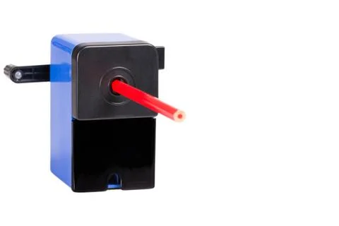 Close-up of a blue sharpener with pencil Stock Photos
