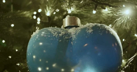 A close-up of blue shining New Year's ball Video stock 261385274