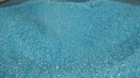 Close up blue sprinkles slow motion Stock Footage 247203230