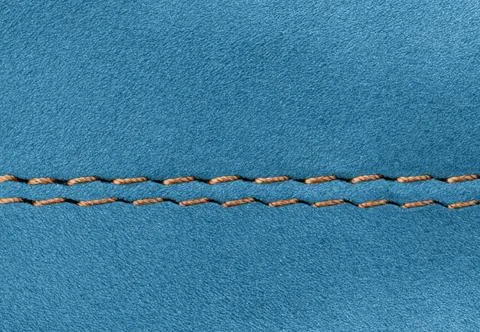 Close-up of Blue suede leather texture with double stitching Stock Photos