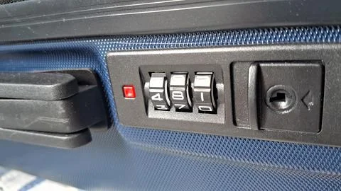 Close up of a blue suitcase combination lock security dial 스톡 사진
