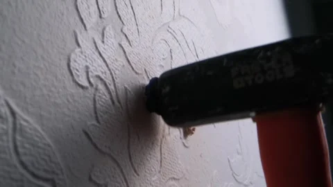 Close-up of blue wall anchor installatio... | Stock Video | Pond5