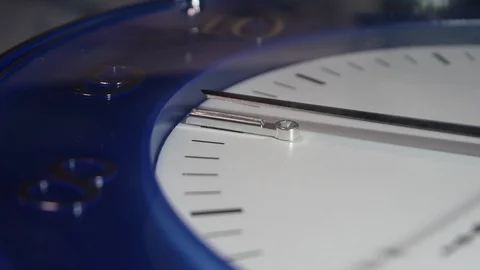 Close-up blue wall clock, seconds hand in focus at 9 o'clock Stock Footage 111278425