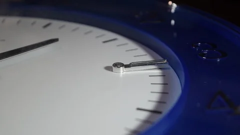 Close-up blue wall clock, seconds hand in focus at 3 o'clock Stock Footage 111278725