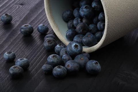 Close up of a blueberries on a wood table. Stock Photos