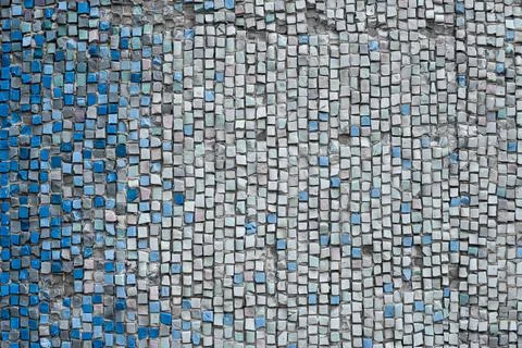 Close-up of a bluish-white gradient made of smalt on a mosaic. Stock Photos