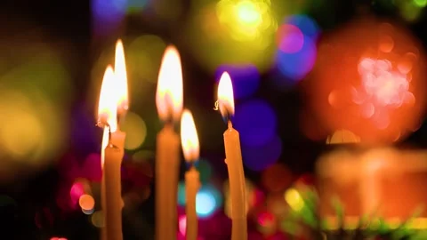 Close up blurred background, festive candles burning against background of Stock Footage 322106919