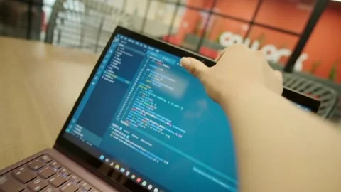 Close-up with blurred background of male hands closing a laptop after work. Stock Footage 311035010