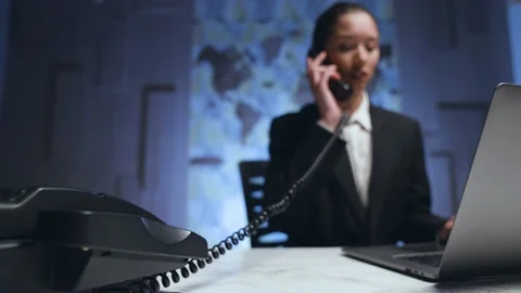 Close-up, blurred focus, woman manager, secretary sitting at the desk working Stock Footage 233994792