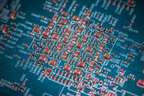 Close-up board with micro chips from an electrical appliance or computer Stock Photos