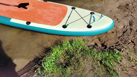 Close up a board for sap on the water ready to sail. Stock Footage 278957404