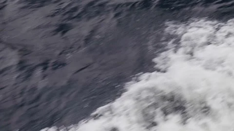 Close up of boat moving through water Stock Footage 327764085