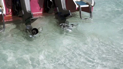 Close up of boat propellers slow motion start up Stock Footage 103248792