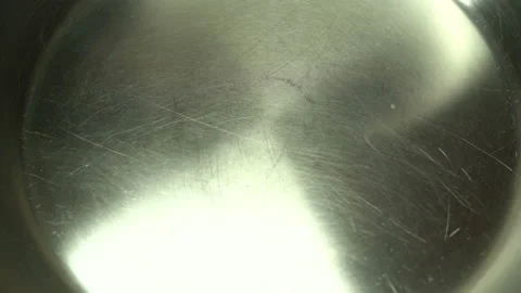 Close-up, Boil water bubble in coating pan heating Stock Footage 127523287