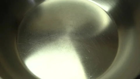Close-up, Boil water bubble in coating pan heating Stock Footage 127523838