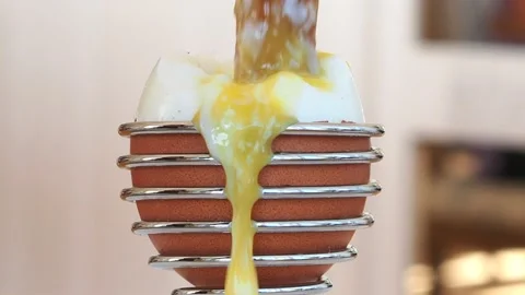Close Up Of Boiled Egg With Egg Yolk Pouring Out, Breakfast, UK 動画素材 221644329