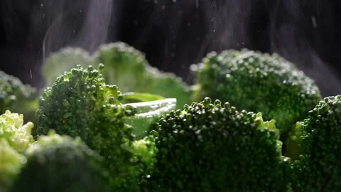 Close-up of boiling broccoli with steam in slow motion Stock-Footage 132227401