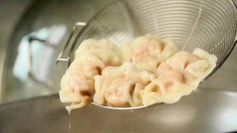 Close-up of boiling dumplings Video stock 330278427