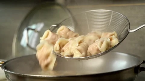 Close-up of boiling dumplings Video stock 330278431