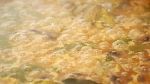 Close-up of Boiling Homemade Vegetable Soup Stock-Footage 283892365