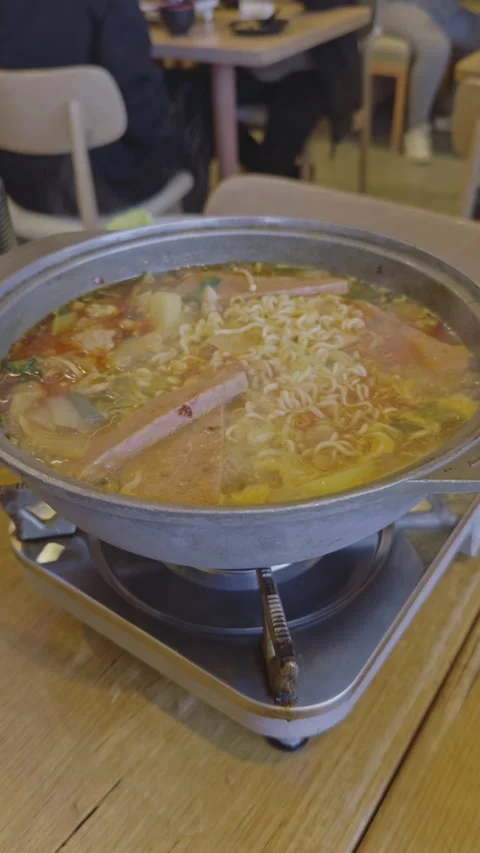Close-up of boiling hot pot with noodles and sliced meat Stock-Footage 314985090