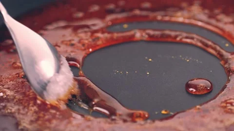 Close up of boiling sugar with bubbles turns into caramel, caramelization, chef Stock Footage 236476082