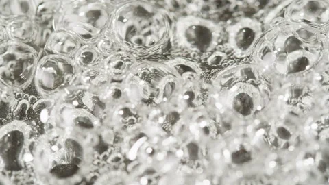 Close up of boiling sugar with bubbles turns into caramel, caramelization, chef Stock Footage 243137390