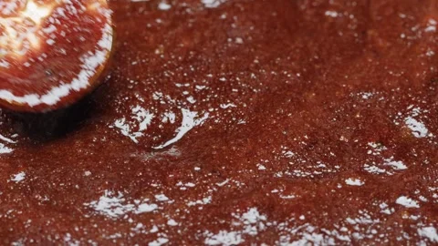Close up of boiling sugar with bubbles turns into caramel, caramelization Stock Footage 258371076