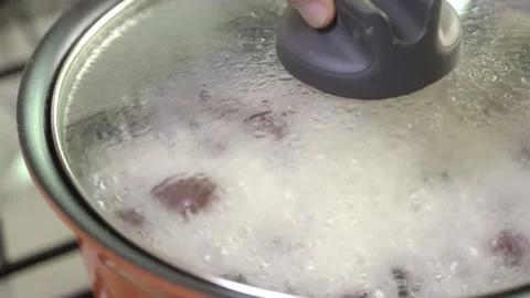 Close up of boiling tea in a pot. Very high temperature Stock Footage 137518323