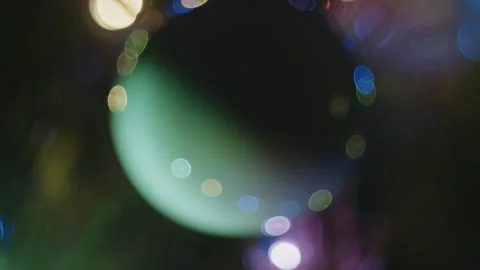 Close-up bokeh of Christmas tree decorations. Video stock 260869740