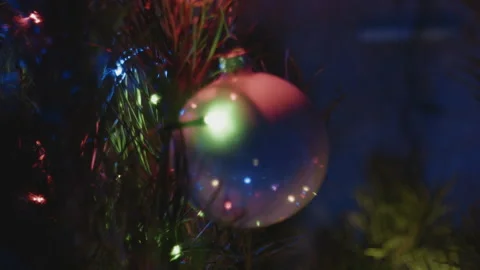 Close-up bokeh of Christmas tree decorations. Video stock 260869882
