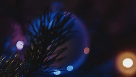 Close-up bokeh of Christmas tree decorations. Video stock 260869893