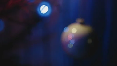Close-up bokeh of Christmas tree decorations. Video stock 260869984