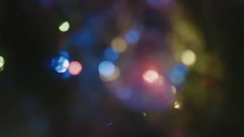Close-up bokeh of Christmas tree decorations. Video stock 260870005